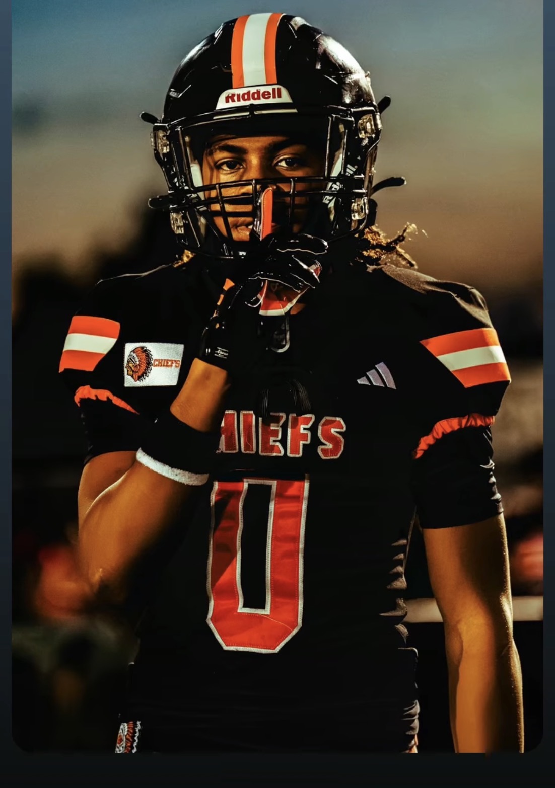 Bryn Davenport in his #0 Chiefs uniform, finger to his lips